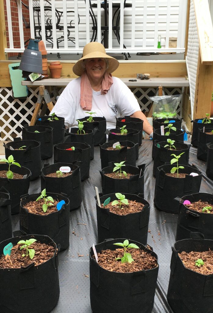Woman with potted plants